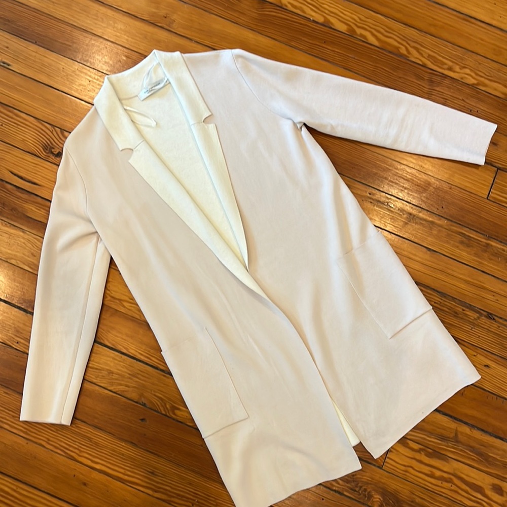 Shell pink and cream white sweater coat, with patch pockets and notched collar.